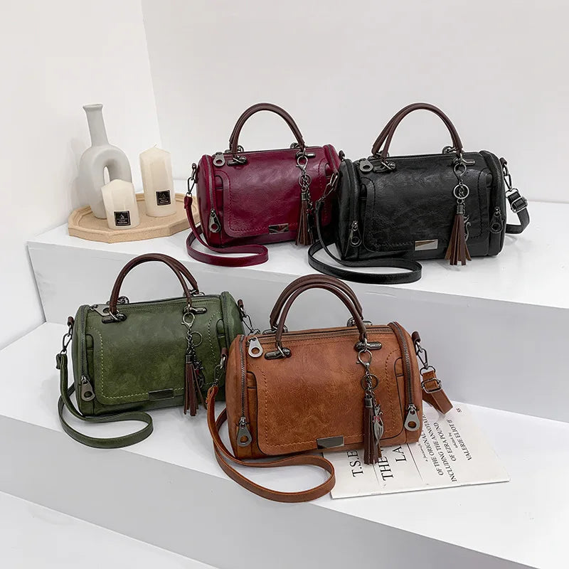 Textured Faux Leather Satchel Bag with Tassel Charm and Metal Latch