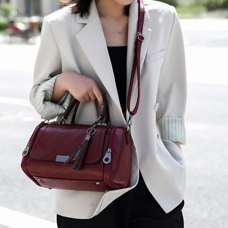 Textured Faux Leather Satchel Bag with Tassel Charm and Metal Latch