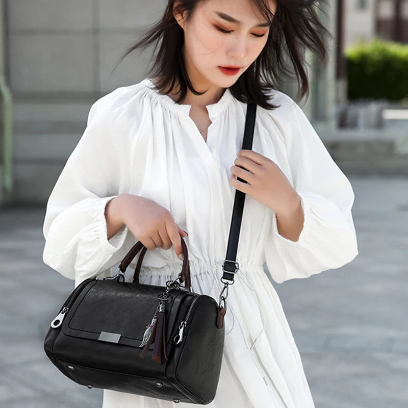 Textured Faux Leather Satchel Bag with Tassel Charm and Metal Latch